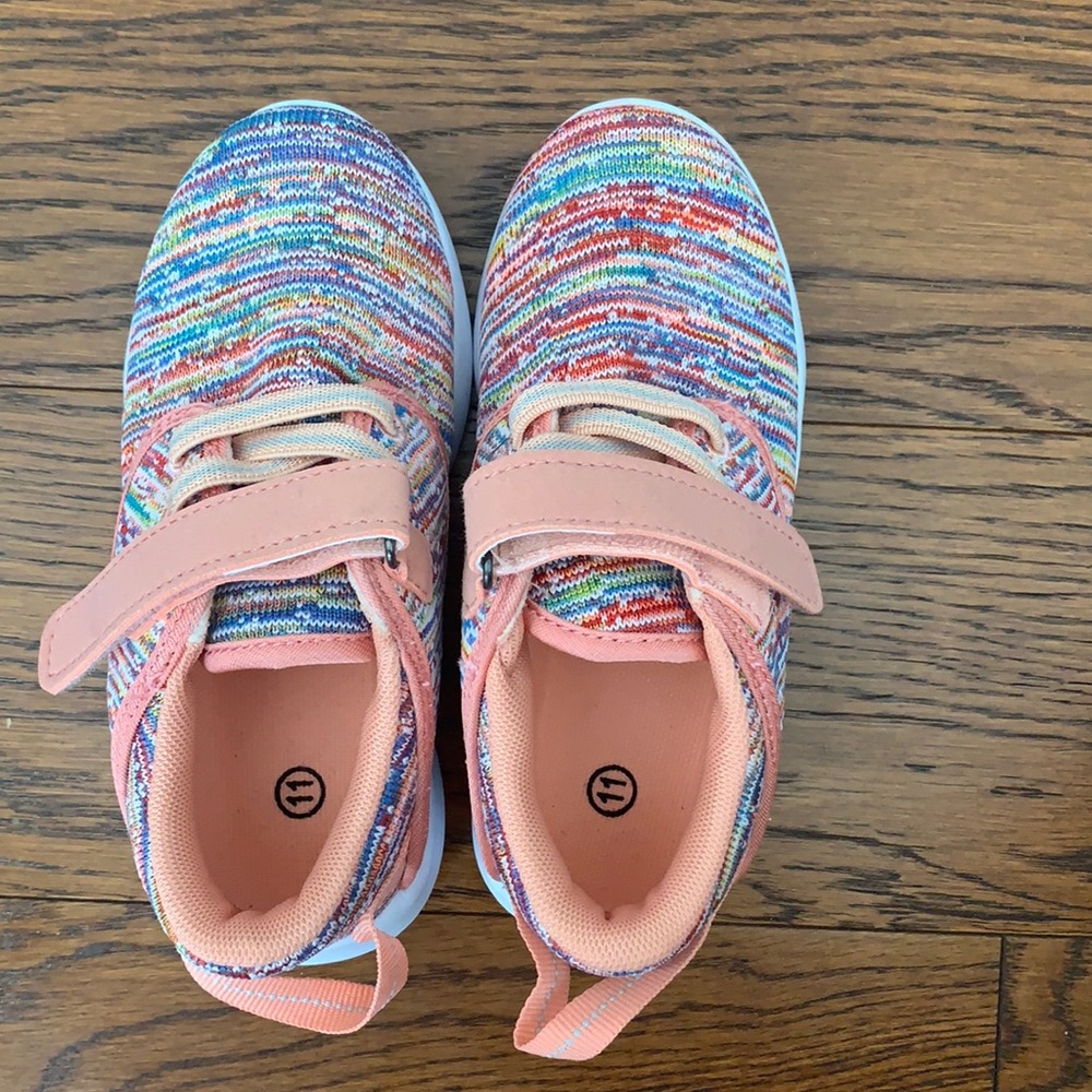 Girl’s size 11c sneakers with Velcro. Rainbow colors. Never been worn.